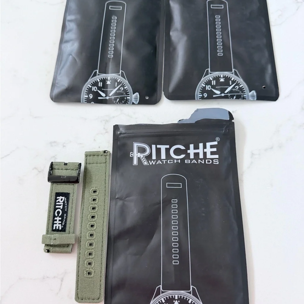 3 pack of Ritche Watch Strap Green,Tan,Black.1 pack is open and 2 pack sealed